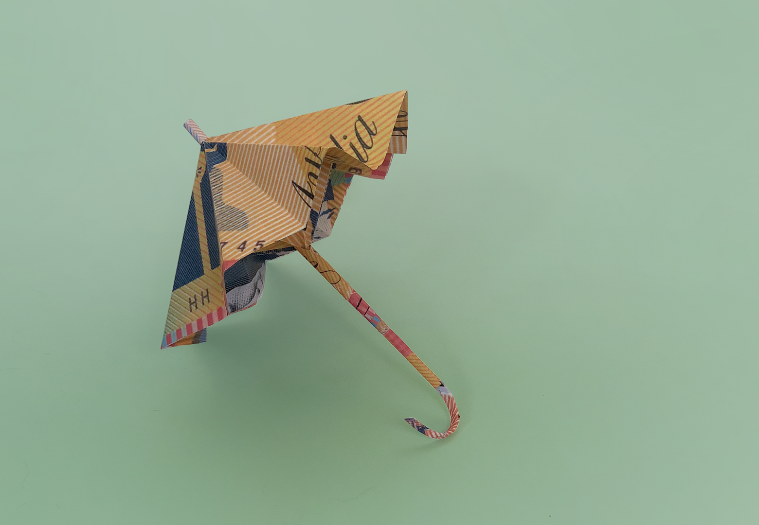 A money paper origami umbrella